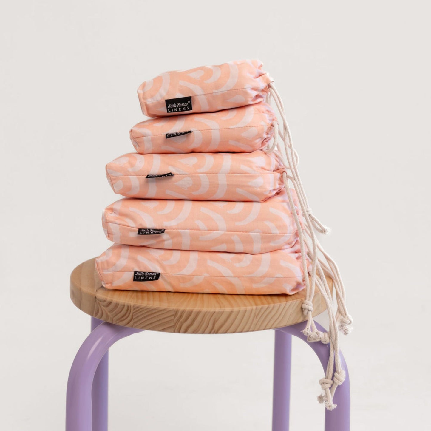 Small Bassinet Waterproof Sheet - Peach Rainbows