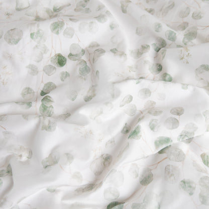 Close-up of eucalyptus organic cotton waterproof fabric used in Little Human Linens fitted sheet, showing soft textured weave