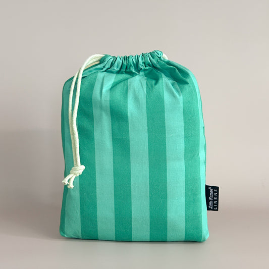 Little Human Linens Mint Candy mini cot waterproof fitted sheet in branded reusable packaging bag